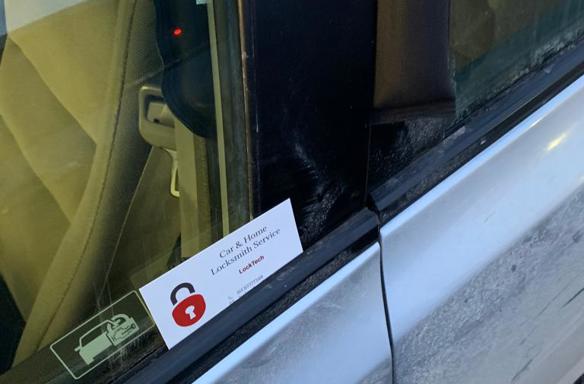 Car lockout service unlocking vehicle door for customer by automotive locksmith.
