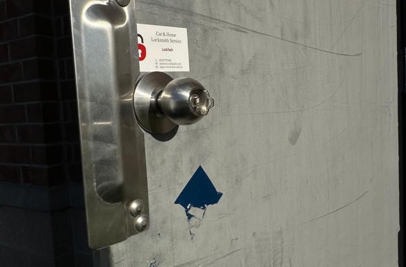 Commercial grade lock installation for secure business and office doors.